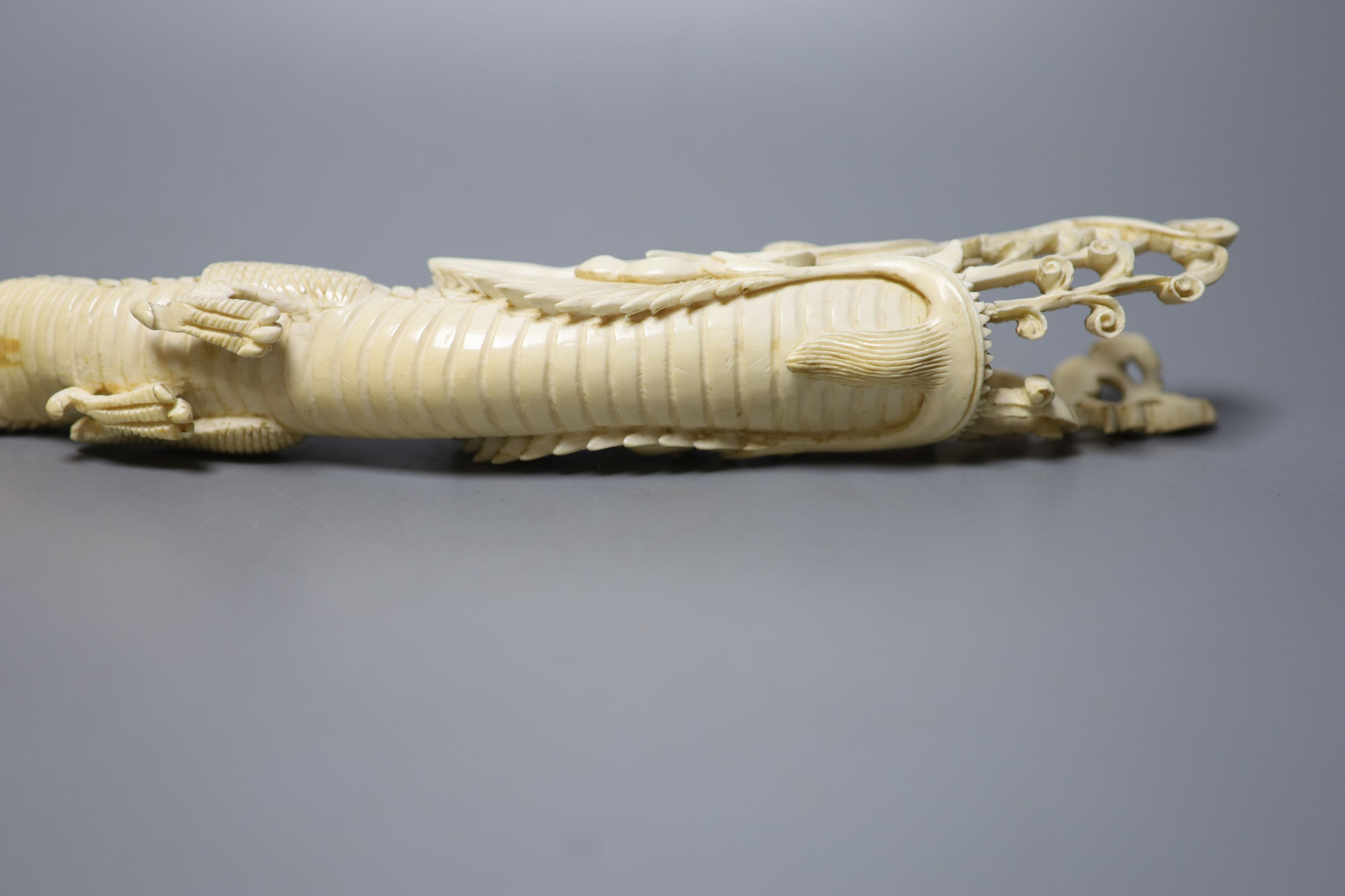 An Indonesian ivory carving of a dragon, first half of 20th century 52cm, , An Indonesian ivory carving of a dragon, first half of 20th century
